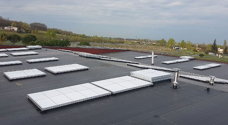 Pose membrane EPDM sur bâtiment industriel